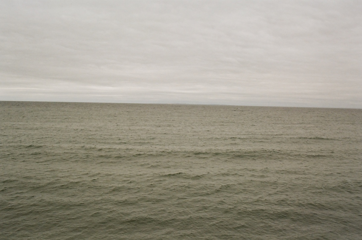 Ocean beneath an overcast sky